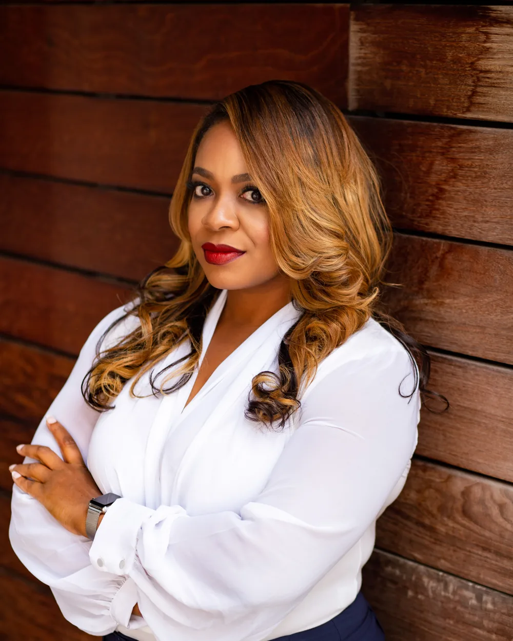 Claire B. Soares, AI consultant, arms crossed in a white blouse