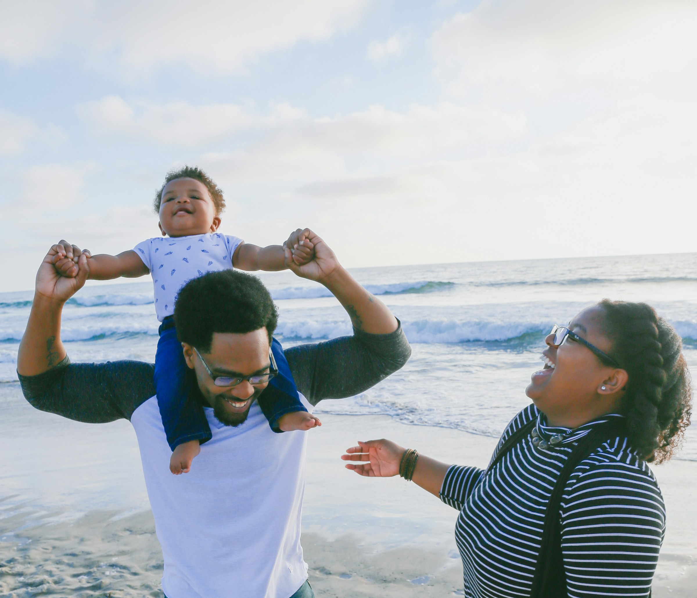 A Black family on a luxury beach vacation — milestone family travel curated by Caviar in the Air